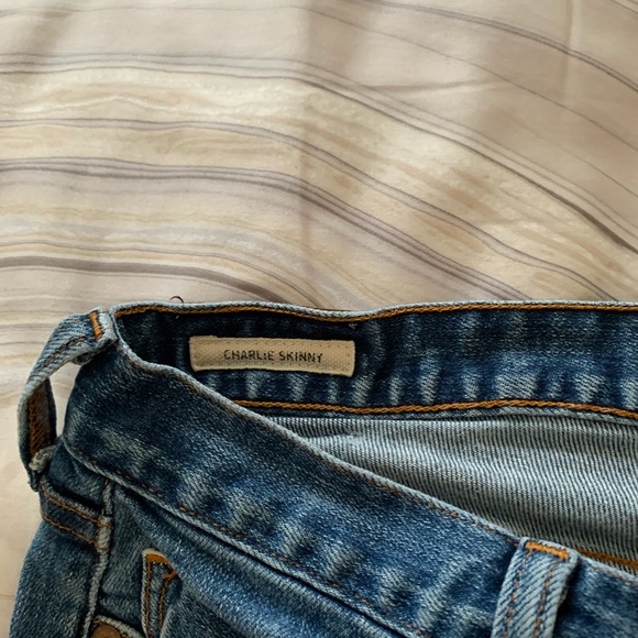 Low rise distressed denim. - Picture 3 of 7